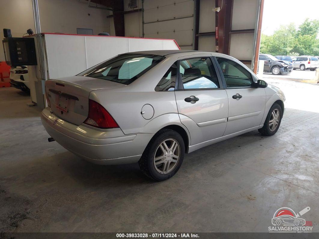 1FAFP34P73W323631 2003 FORD FOCUS photo no. 4