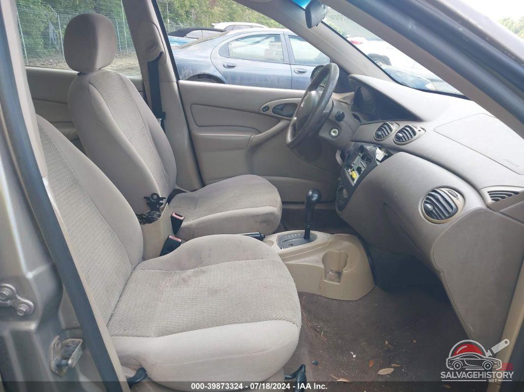 1FAFP34Z34W180924 2004 FORD FOCUS photo no. 5
