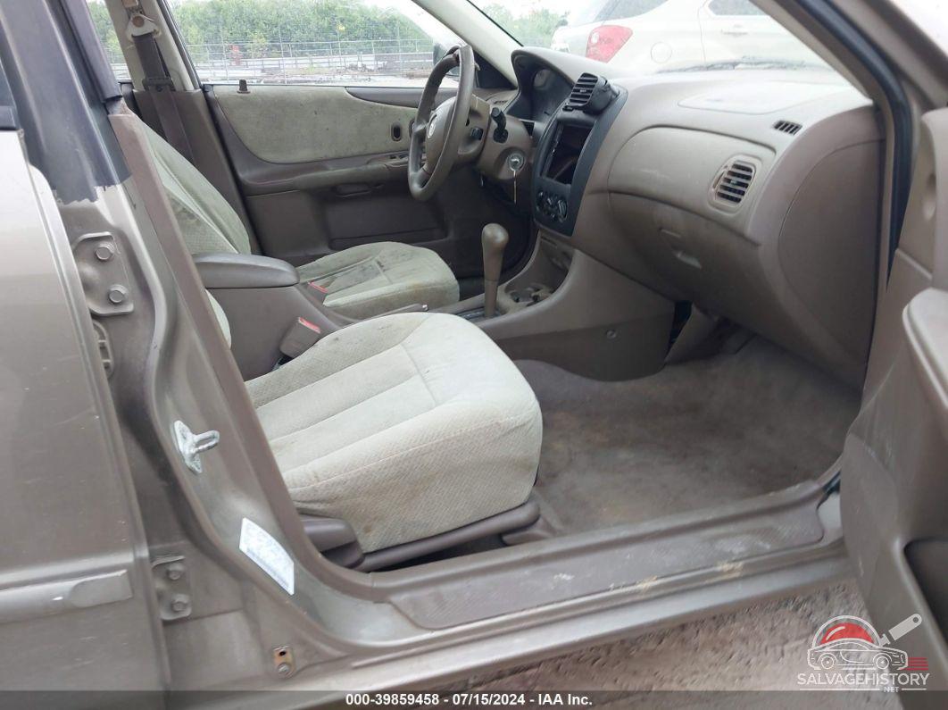 JM1BJ2225Y0311211 2000 MAZDA PROTEGE photo no. 5