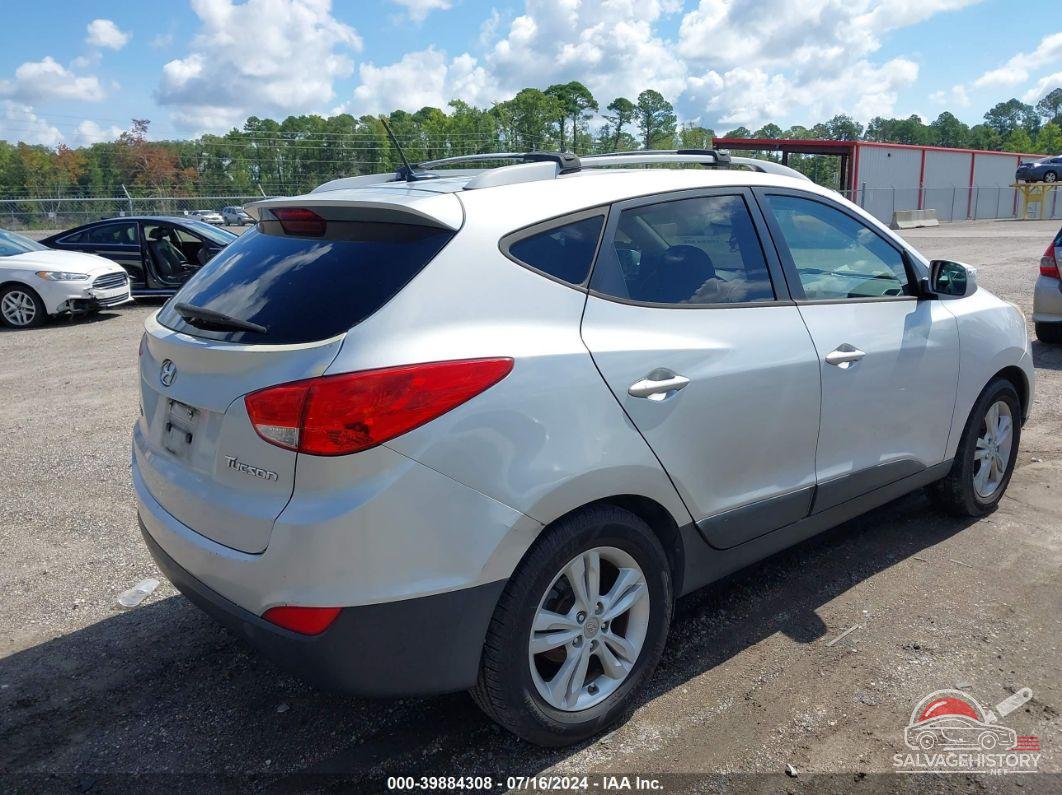 KM8JU3AC6CU511711 2012 HYUNDAI TUCSON photo no. 4