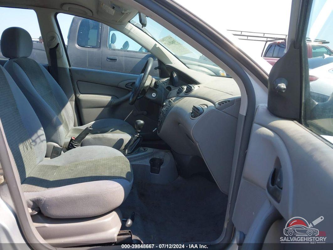 1FAFP33Z14W130055 2004 FORD FOCUS photo no. 5