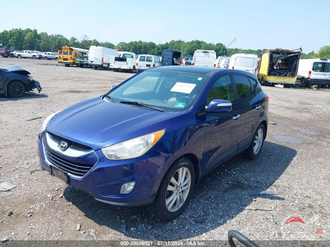 KM8JUCAC4CU381346 2012 HYUNDAI TUCSON photo no. 6