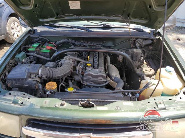 2CNBJ18C1X6909209 1999 CHEVROLET TRACKER photo no. 11
