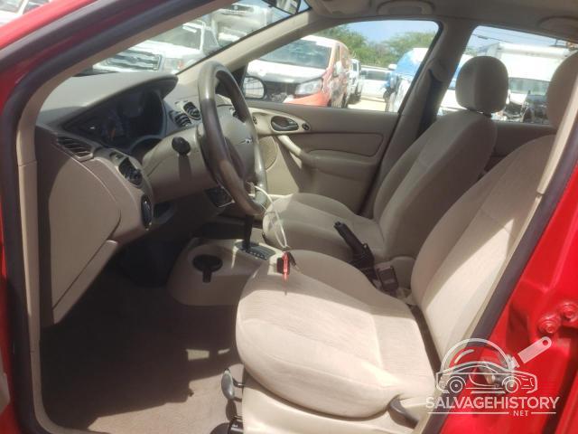 1FAFP3434YW256913 2000 FORD FOCUS photo no. 7