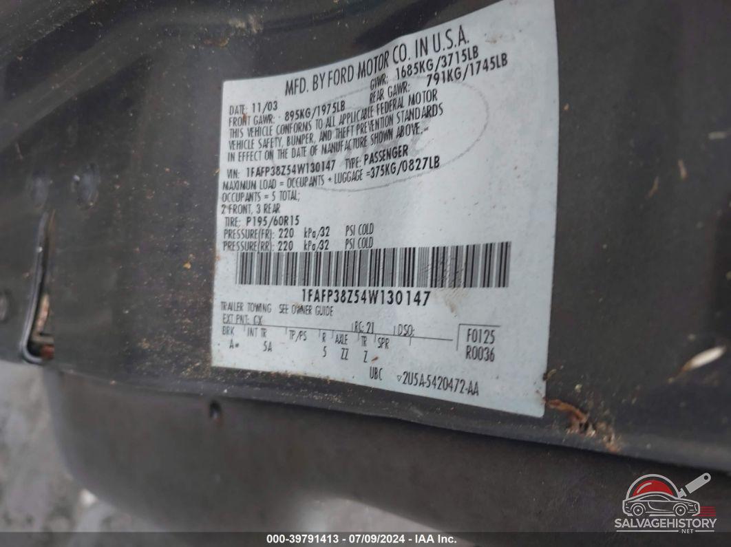 1FAFP38Z54W130147 2004 FORD FOCUS photo no. 9